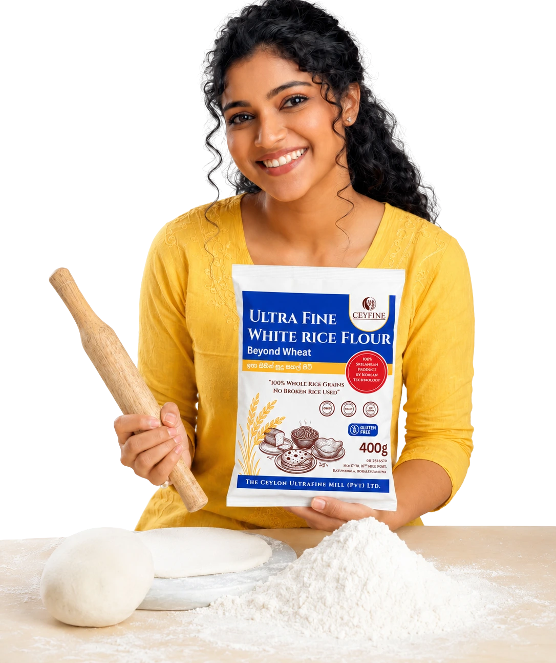 A smiling woman holding a retail package of Ceyfine Ultra Fine White Rice Flour by The Ceylon UltraFine Mill